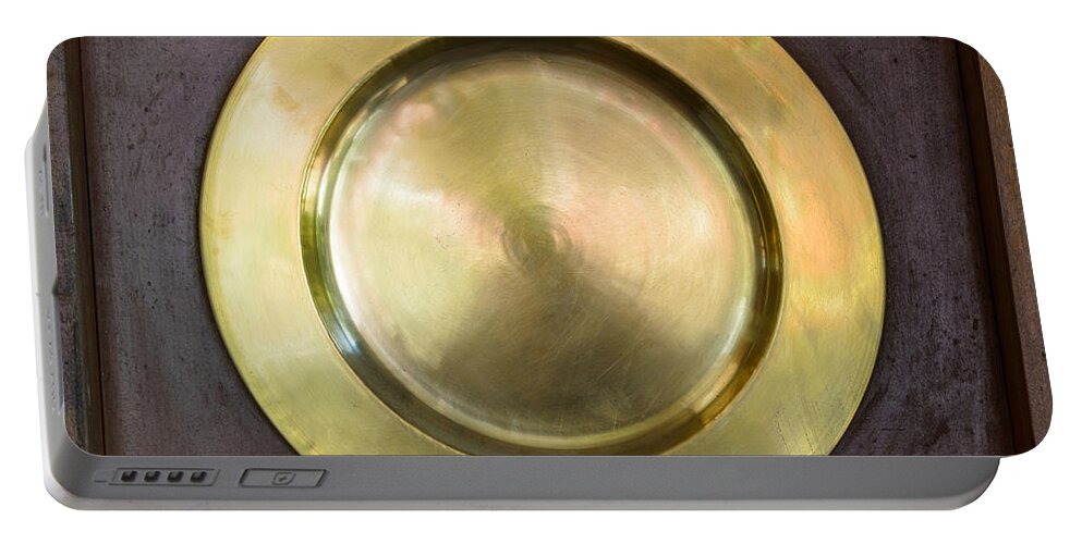 Plate Portable Battery Charger featuring the photograph Brass plate by Dutourdumonde Photography