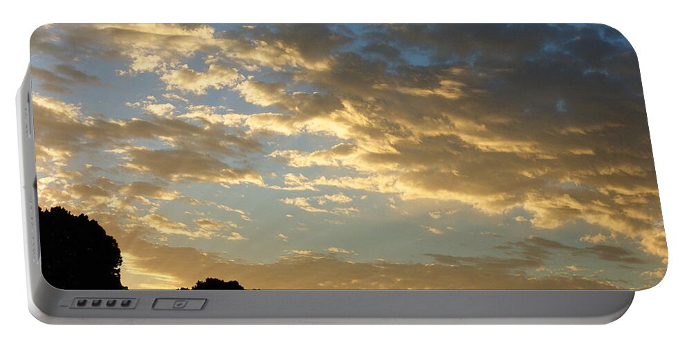 Skyscape Portable Battery Charger featuring the photograph Breaking Through by Glenn McCarthy Art and Photography