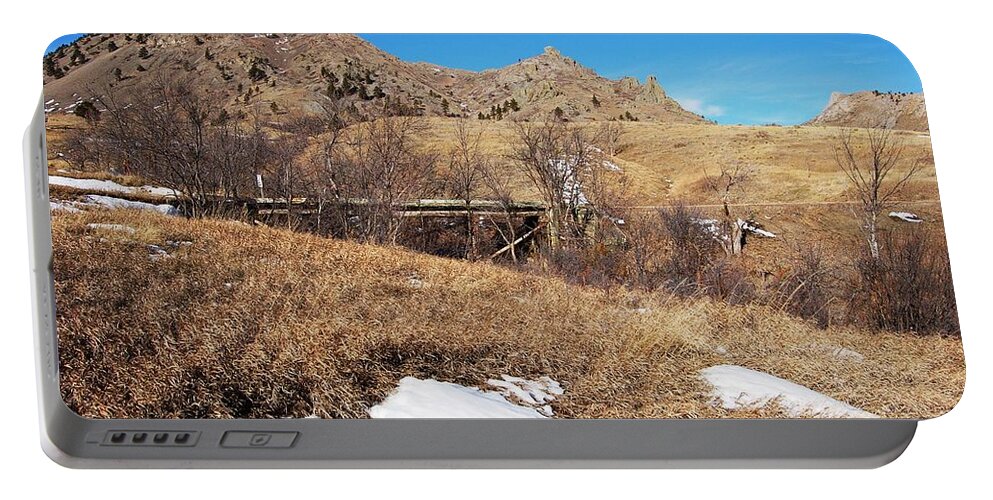 Dakota Portable Battery Charger featuring the photograph Bridge at Mato Paha-Bear Butte by Greni Graph
