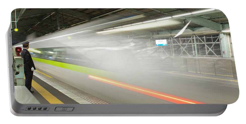 Shinkansen Portable Battery Charger featuring the photograph Bullet Train by Sebastian Musial