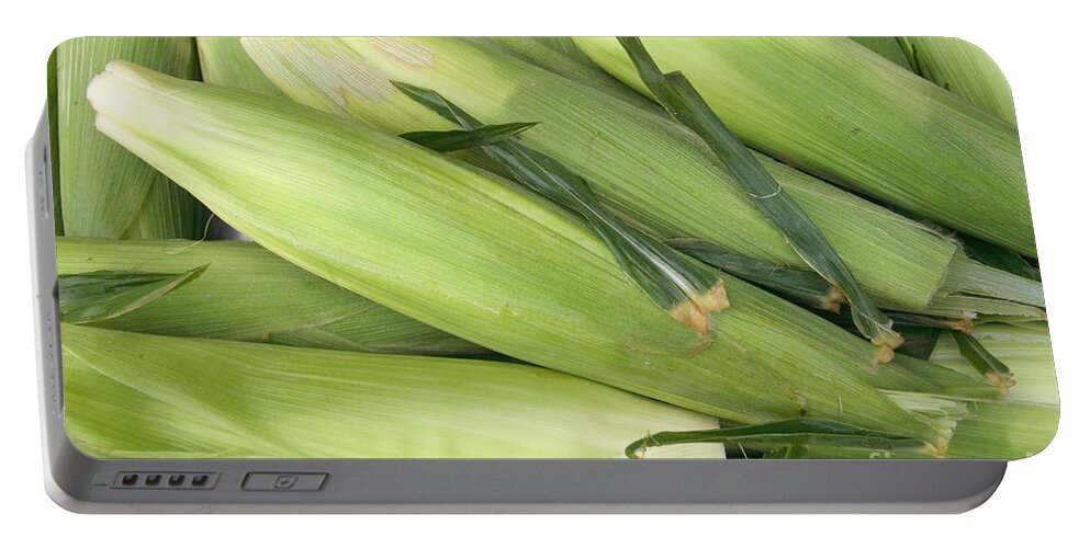 Corn Portable Battery Charger featuring the photograph Bunch of corn in husk by James BO Insogna