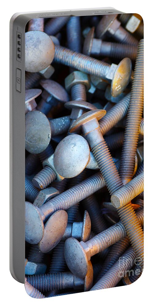 Aluminium Portable Battery Charger featuring the photograph Bunch of Screws by Carlos Caetano