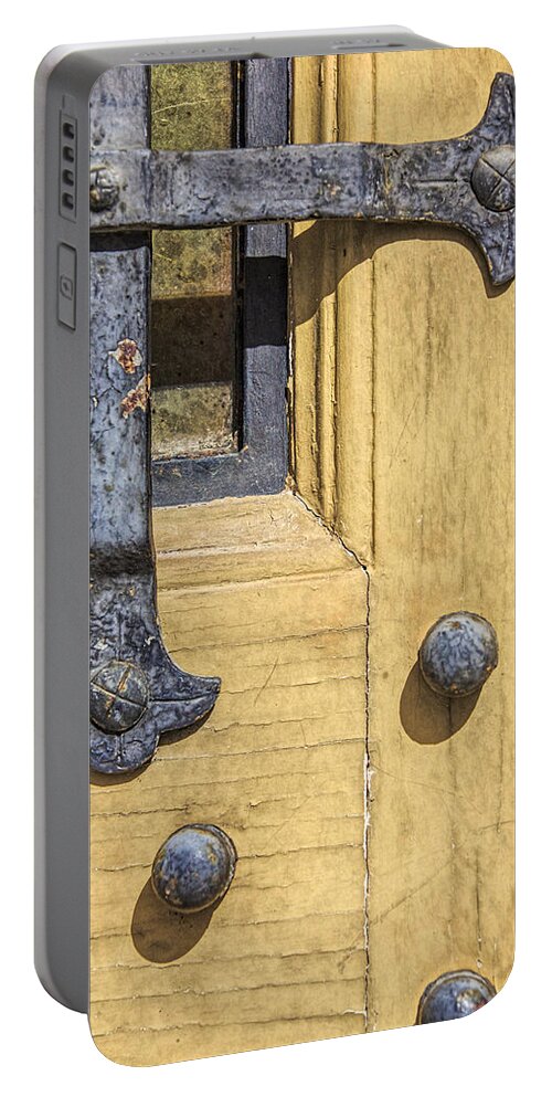Aged Portable Battery Charger featuring the photograph Castle Door III by David Letts
