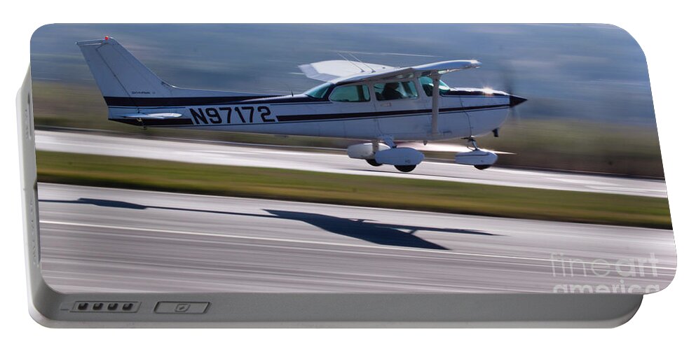 Cessna Portable Battery Charger featuring the photograph Cessna Takeoff by John Daly