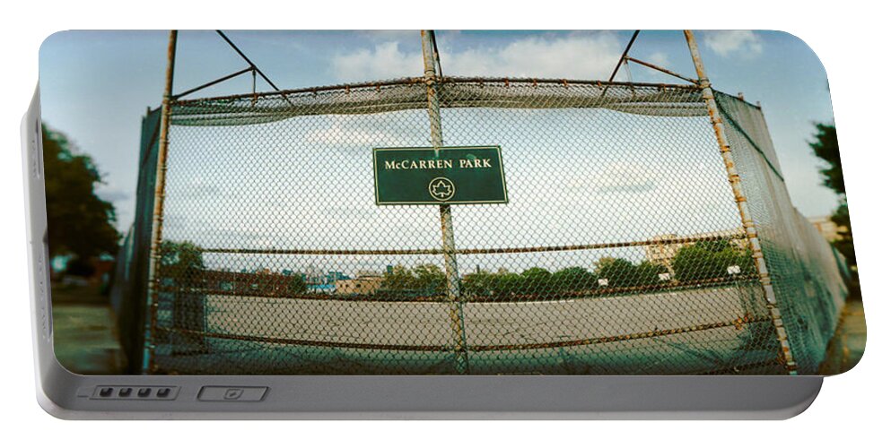 Photography Portable Battery Charger featuring the photograph Chainlink Fence In A Public Park by Panoramic Images