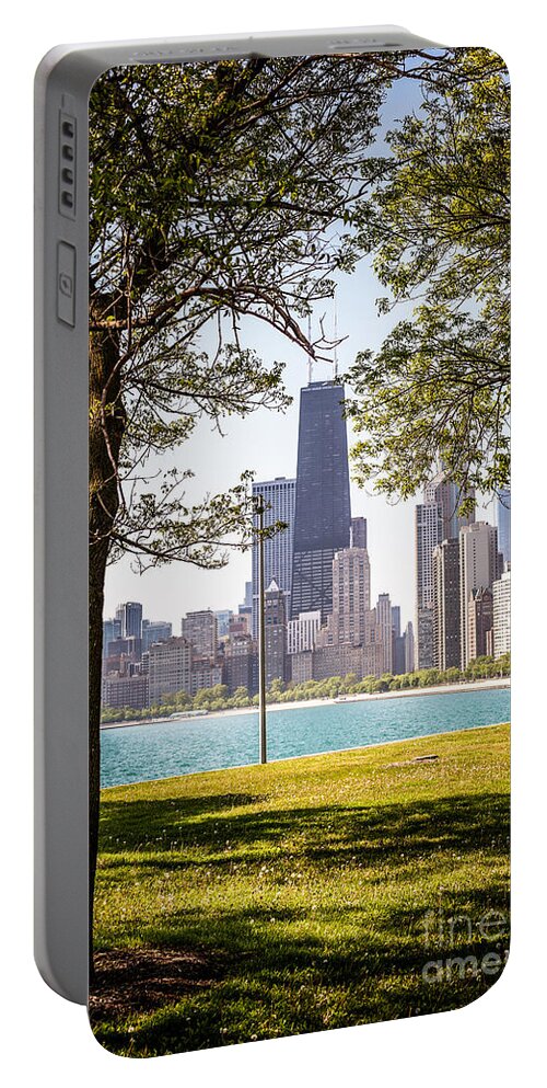 America Portable Battery Charger featuring the photograph Chicago Skyline and Hancock Building Through Trees by Paul Velgos