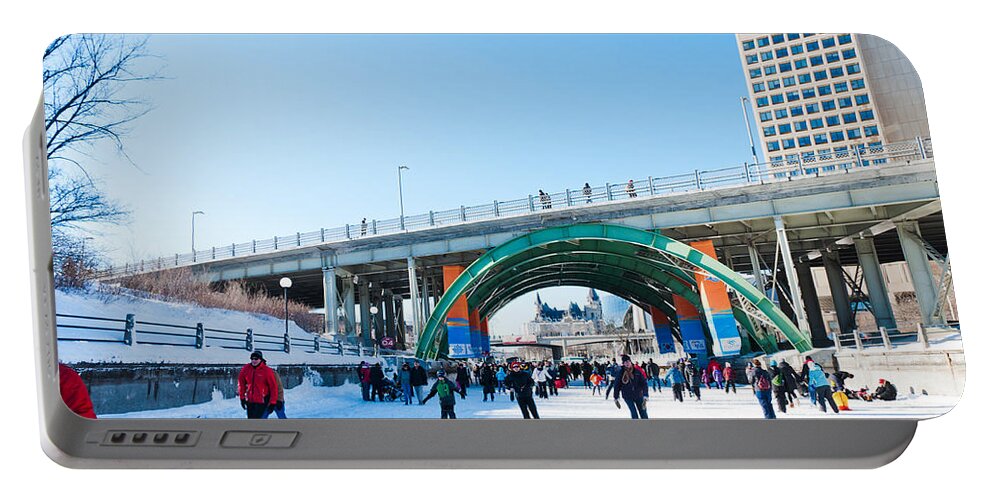 Winterlude Portable Battery Charger featuring the photograph City Skating by Cheryl Baxter