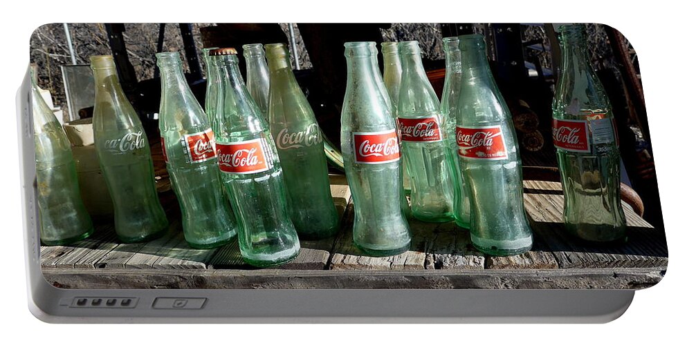  Portable Battery Charger featuring the photograph Coke Bottles by Mars Besso