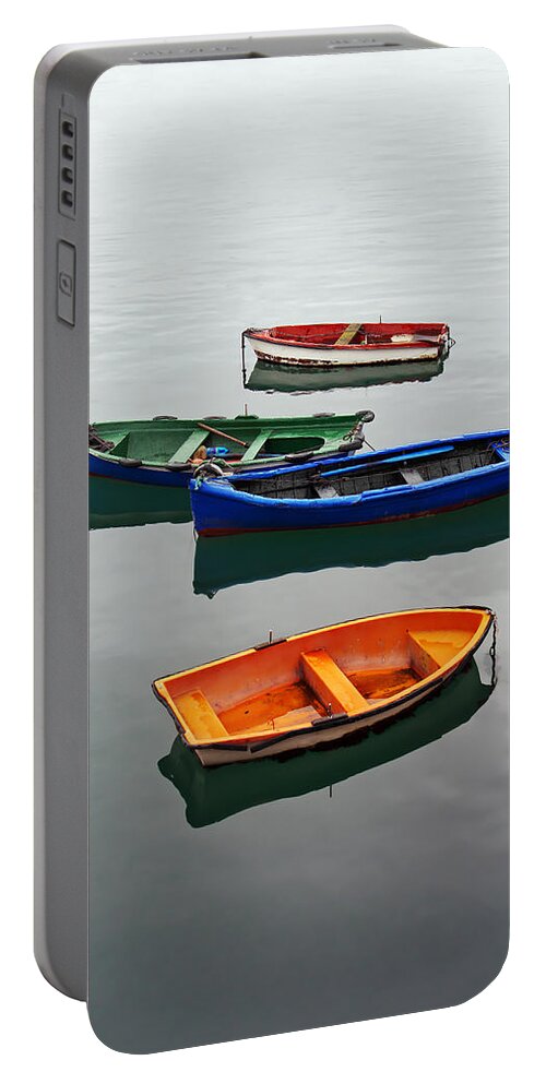 Fishing Portable Battery Charger featuring the photograph colorful boats on Santurtzi by Mikel Martinez de Osaba