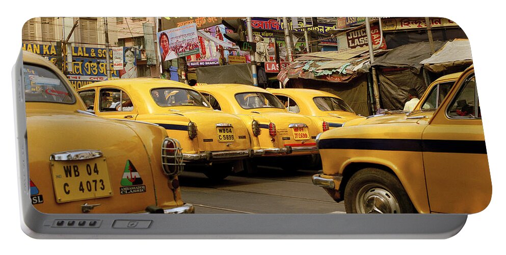 Yellow Portable Battery Charger featuring the photograph The Colors Of Calcutta by Shaun Higson