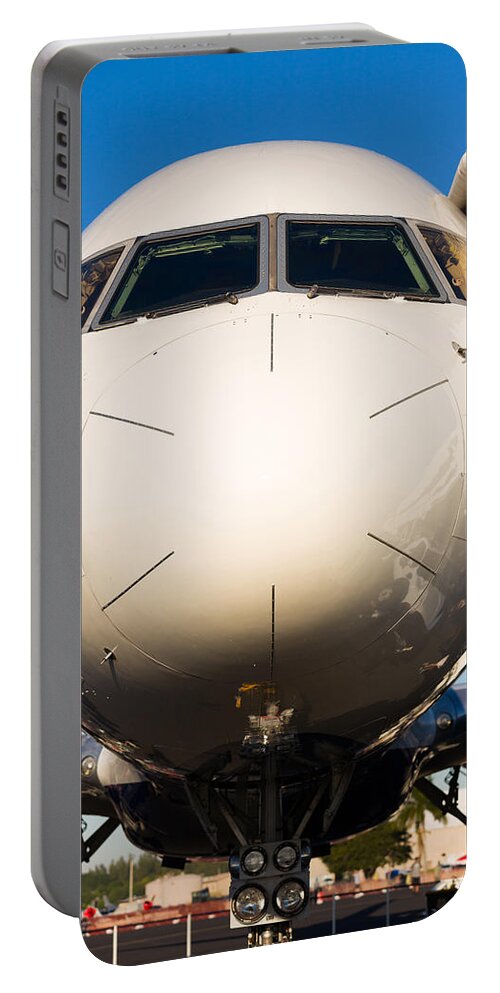 Aerospace Portable Battery Charger featuring the photograph Commercial Airliner by Raul Rodriguez