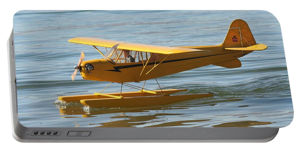 Piper Cub Portable Battery Charger featuring the photograph Cub on floats by David S Reynolds