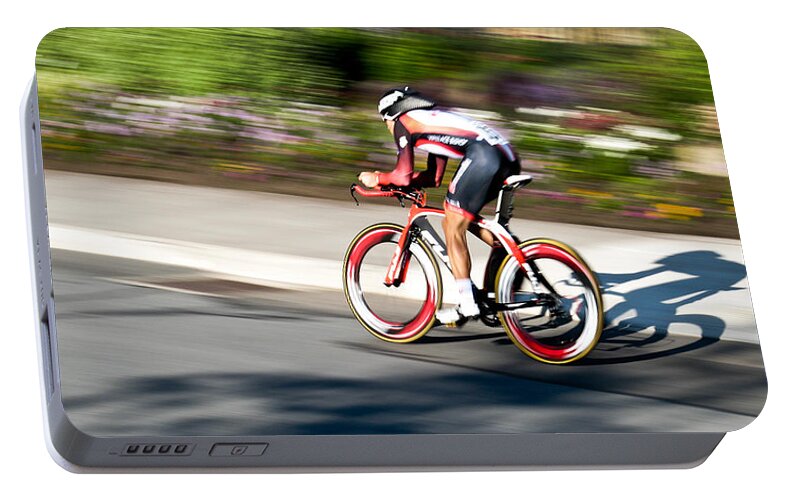 Cyclist Portable Battery Charger featuring the photograph Cyclist Racing the Clock by Kevin Desrosiers