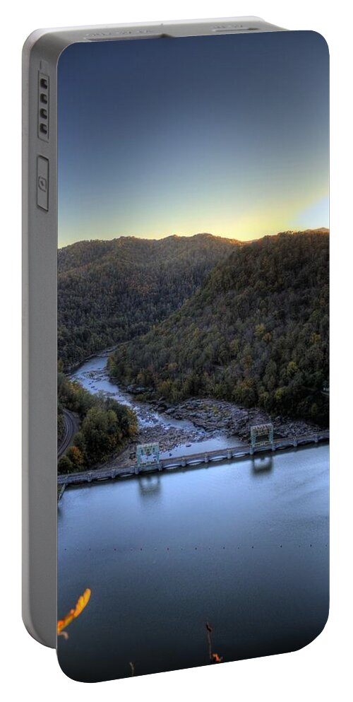 River Portable Battery Charger featuring the photograph Dam Across the river by Jonny D