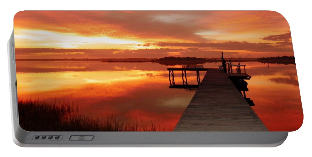 Orange Waterscapes Portable Battery Charger featuring the photograph DAWN of NEW YEAR by Karen Wiles
