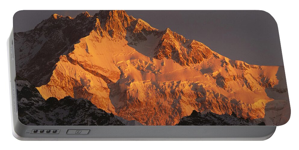 Feb0514 Portable Battery Charger featuring the photograph Dawn On Kangchenjunga Talung by Colin Monteath