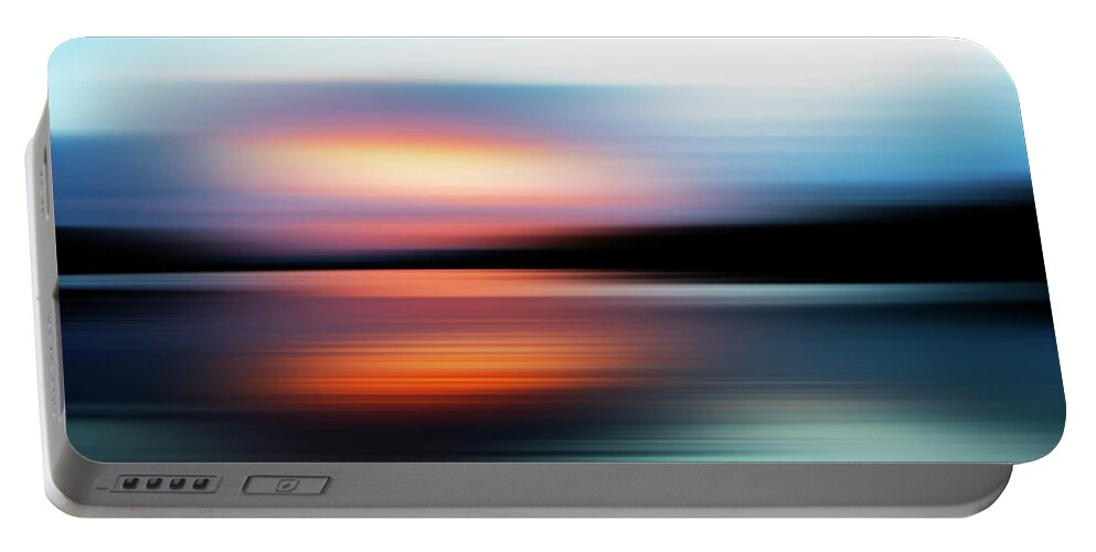 Abstract Portable Battery Charger featuring the photograph Defocused View Of Sunset Over Lake by Ikon Ikon Images