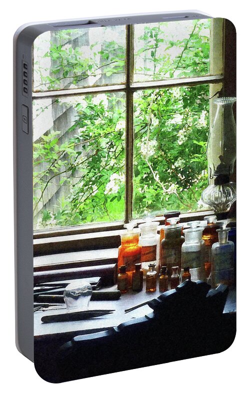 Medicine Portable Battery Charger featuring the photograph Doctor - Medicine and Hurricane Lamp by Susan Savad