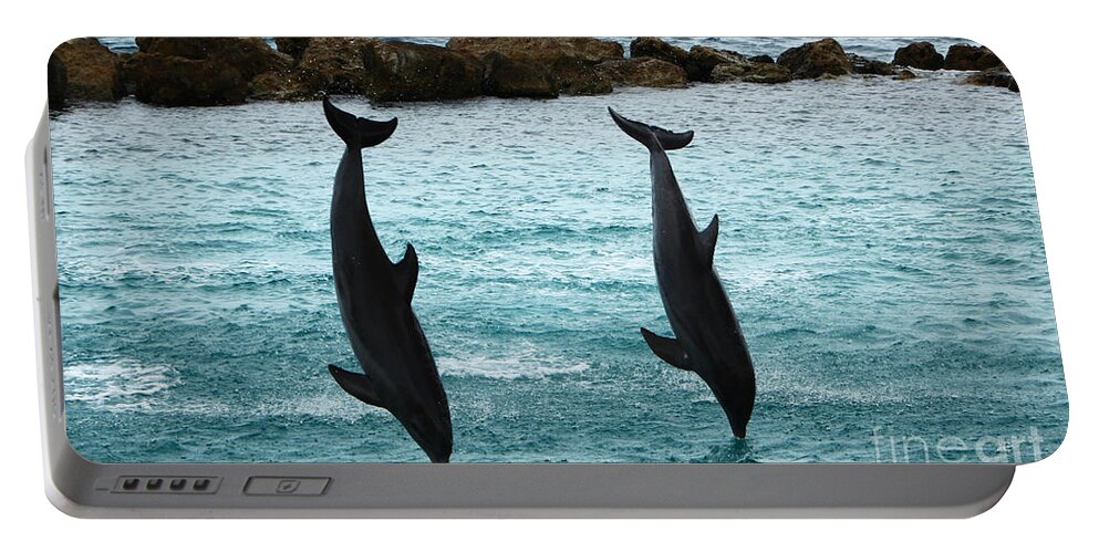 Dolphin Portable Battery Charger featuring the photograph Upside down by Adriana Zoon