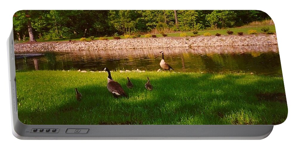 Duck Portable Battery Charger featuring the photograph Duck Family Getting Back From Pond by Chris W Photography AKA Christian Wilson
