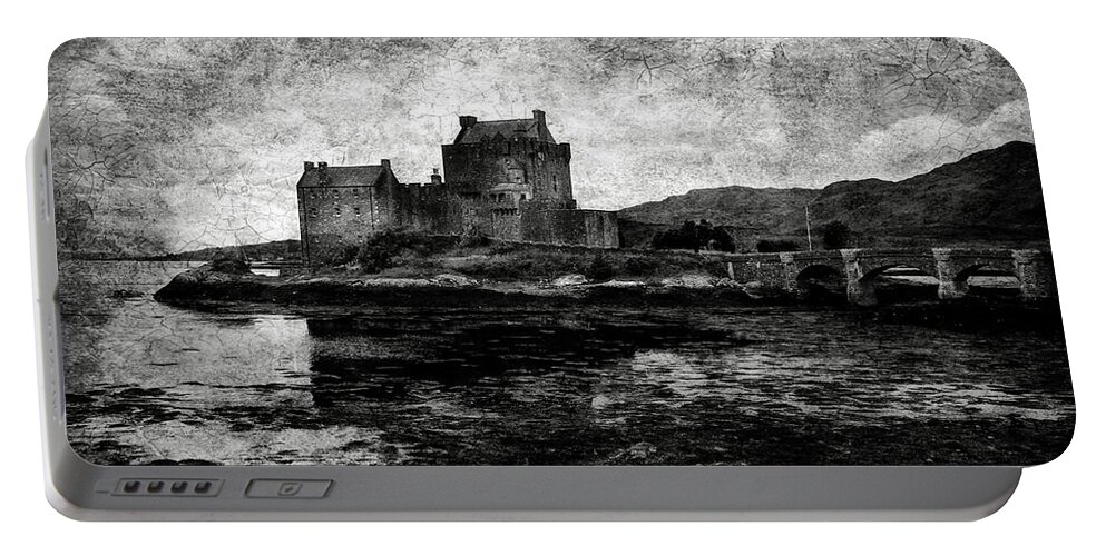 Eilean Portable Battery Charger featuring the photograph Eilean Donan castle in Scotland BW by RicardMN Photography