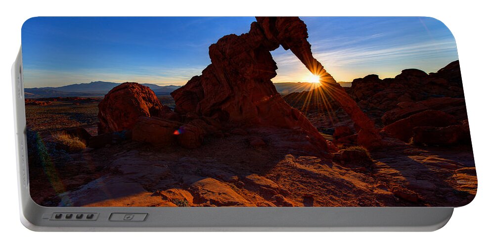 Elephant Arch Portable Battery Charger featuring the photograph Elephant Sunrise by Chad Dutson