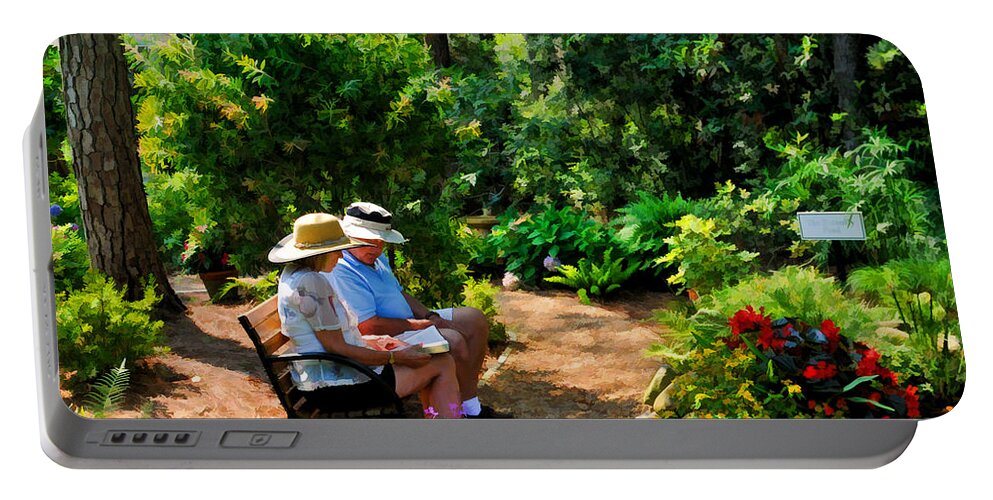 Garden Portable Battery Charger featuring the photograph Loving Couple Enjoying Their Prayer Garden by Ginger Wakem