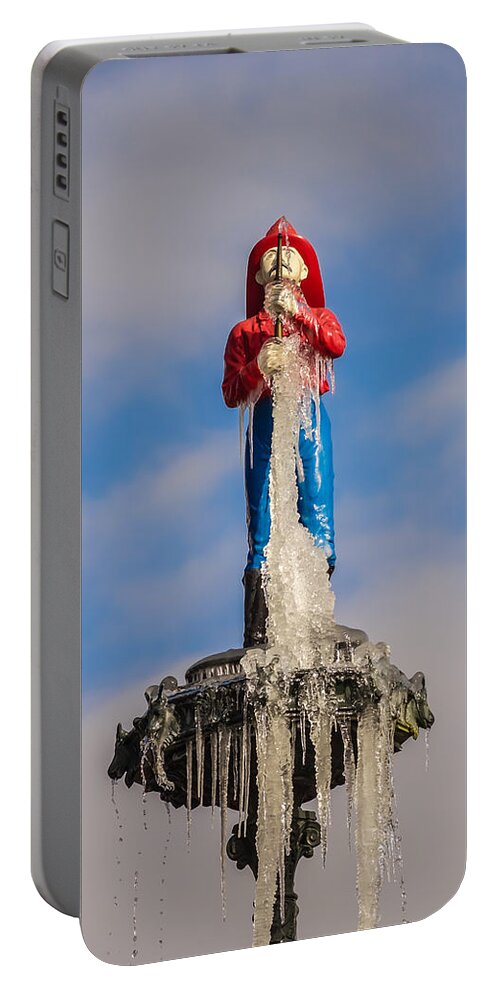 Chattanooga Portable Battery Charger featuring the photograph Fireman statue in winter by Tom and Pat Cory