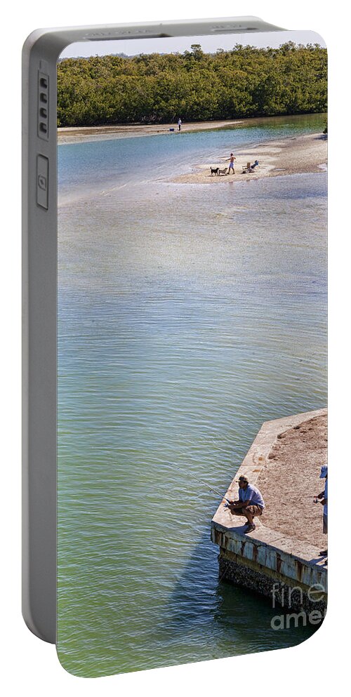 Florida Portable Battery Charger featuring the photograph Fishing in Estero Bay near Fort Myers Beach Florida by William Kuta