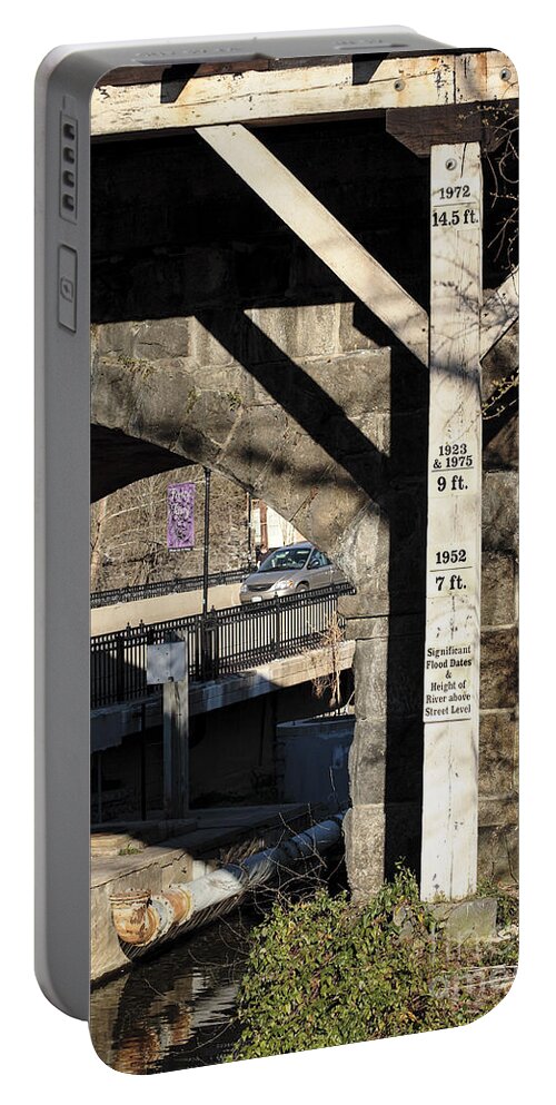 Ellicott City Portable Battery Charger featuring the photograph Flood height sign at Ellicott City Maryland by William Kuta