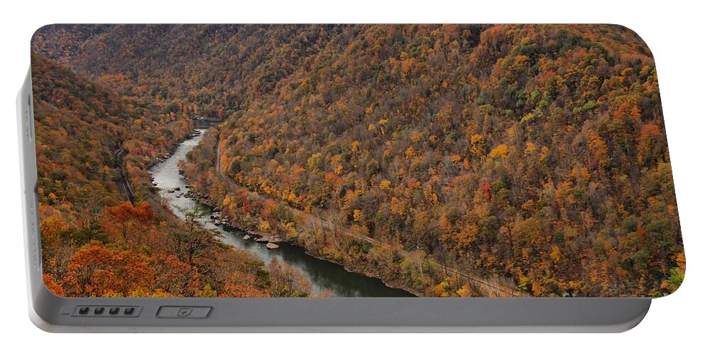 New River Gorge Portable Battery Charger featuring the photograph Flooded With Fall Colors At New River by Adam Jewell