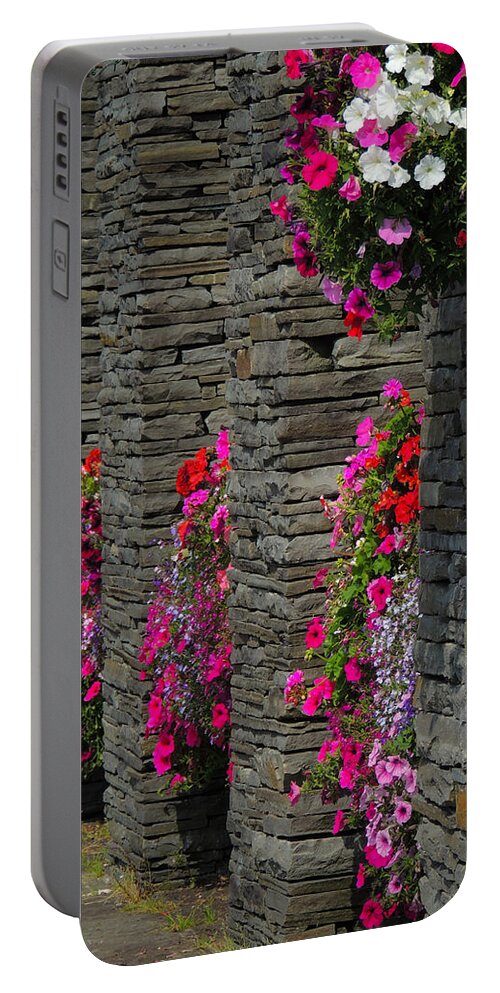 Flowers Portable Battery Charger featuring the photograph Flowers at Liscannor Rock Shop by James Truett