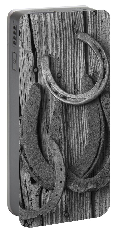 Four Horseshoes Portable Battery Charger featuring the photograph Four Horseshoes by Garry Gay