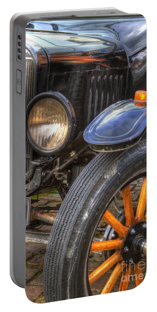 Heiko Portable Battery Charger featuring the photograph Front Wheel Axle by Heiko Koehrer-Wagner