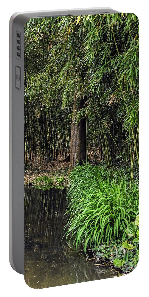 Travel Portable Battery Charger featuring the photograph Garden's Edge by Elvis Vaughn