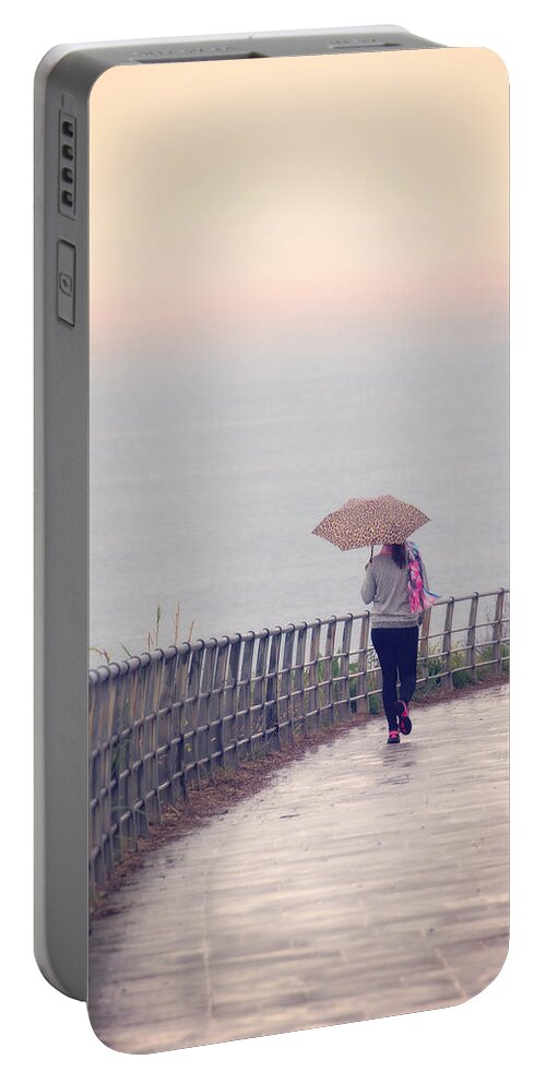 Umbrella Portable Battery Charger featuring the photograph Girl Walking With Umbrella by Mikel Martinez de Osaba
