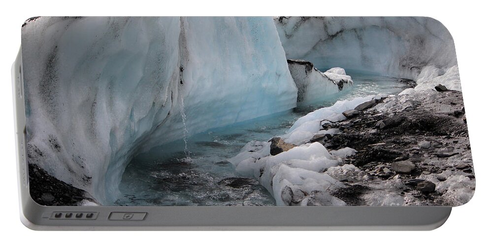 Glacier Portable Battery Charger featuring the photograph Glacial Waters by Creative Solutions RipdNTorn
