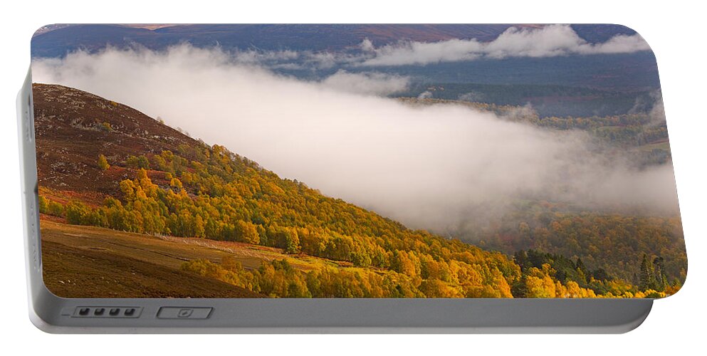 Autumn Portable Battery Charger featuring the photograph Glenmore Forest and the Cairngorms by Louise Heusinkveld