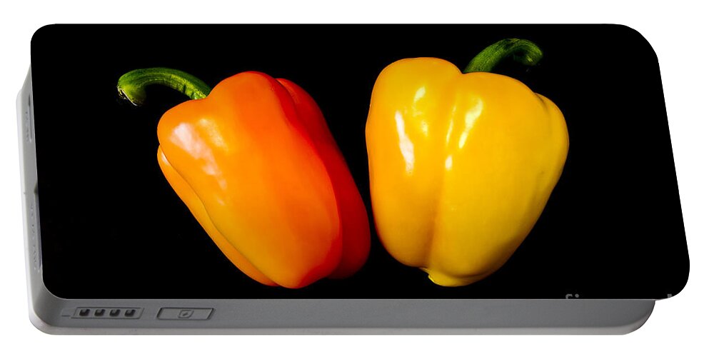 Pepper Portable Battery Charger featuring the photograph Glowing Peppers by Anthony Sacco