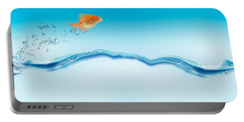 Photography Portable Battery Charger featuring the photograph Goldfish Jumping Out Of Water by Panoramic Images