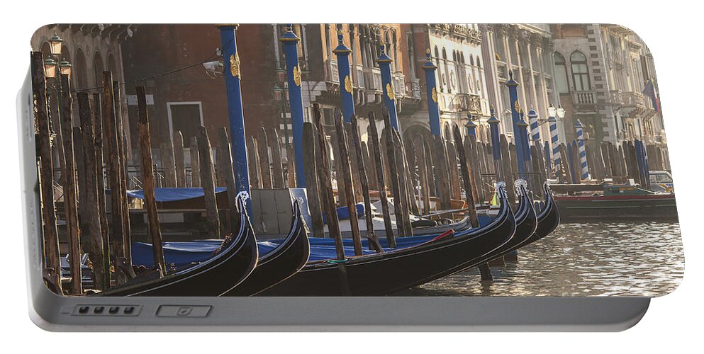 Architecture Portable Battery Charger featuring the photograph Gondolas in sunset by Patricia Hofmeester