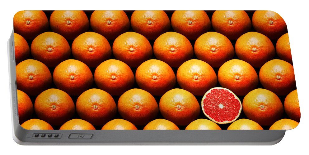 Grapefruit Portable Battery Charger featuring the photograph Grapefruit slice between group by Johan Swanepoel