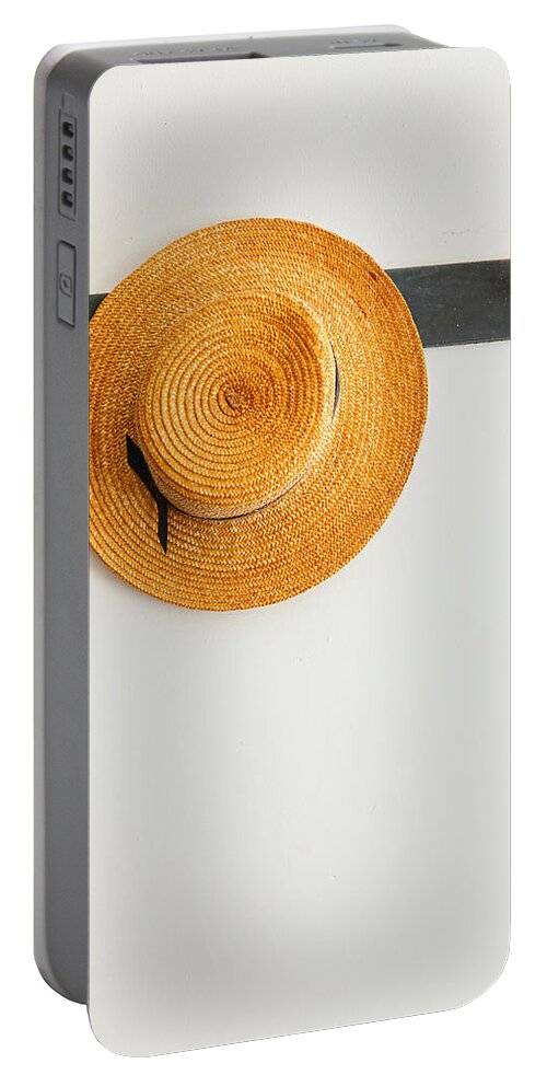 Hat Portable Battery Charger featuring the photograph Hanging There by Alexey Stiop