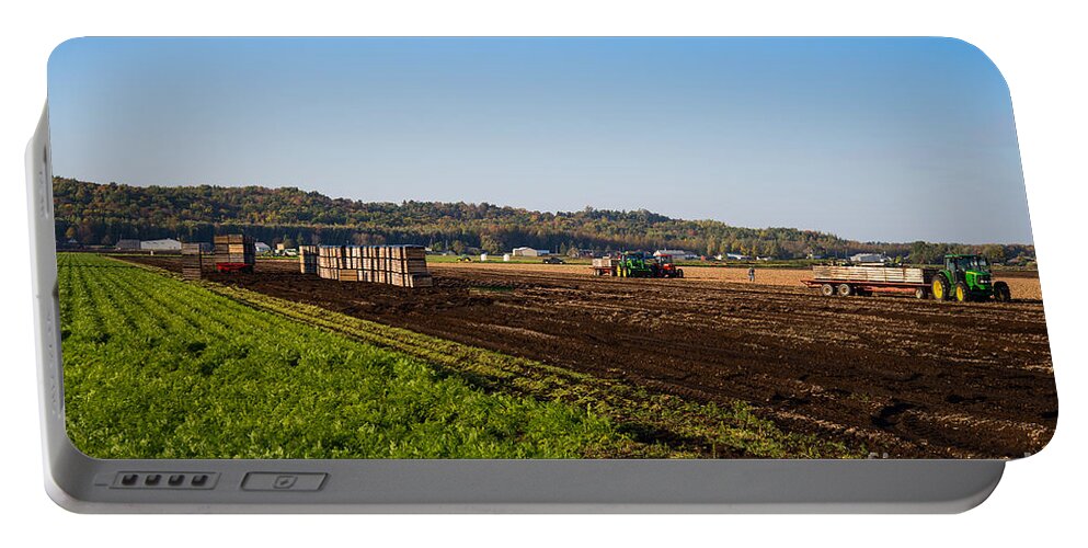 Farm Portable Battery Charger featuring the photograph Harvest Time in Holland Marsh Ontario by Les Palenik