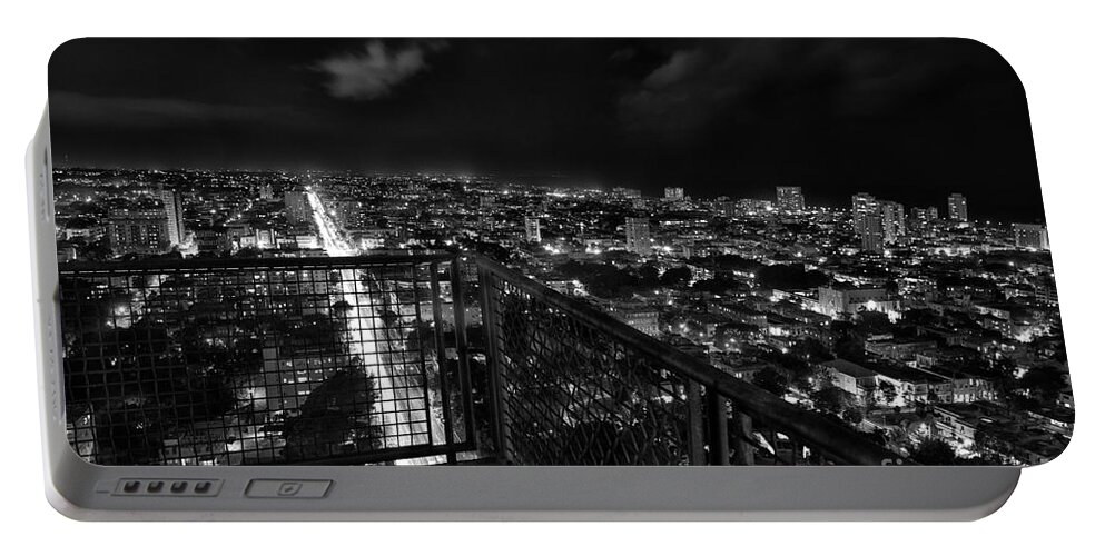 Streets Portable Battery Charger featuring the photograph Havana at night by Jose Rey
