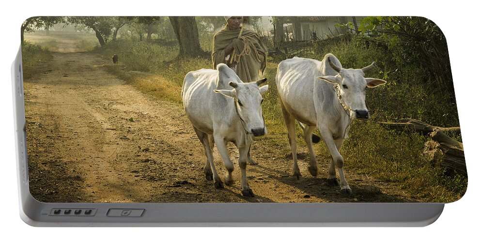 India Portable Battery Charger featuring the photograph Heading Home by Fran Gallogly