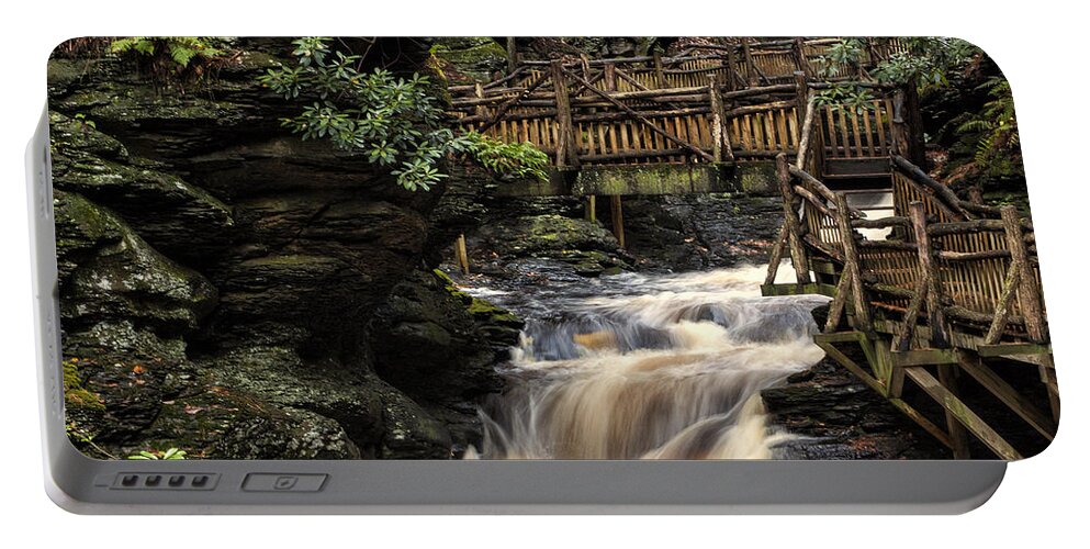 Landscape Portable Battery Charger featuring the photograph Heavy Flow by Rob Dietrich
