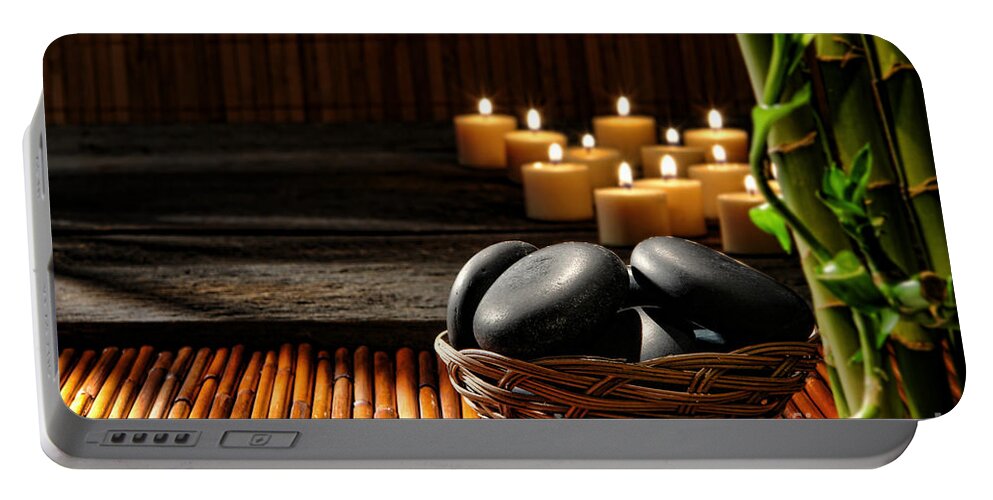 Stones Portable Battery Charger featuring the photograph Holistic Massage by Olivier Le Queinec