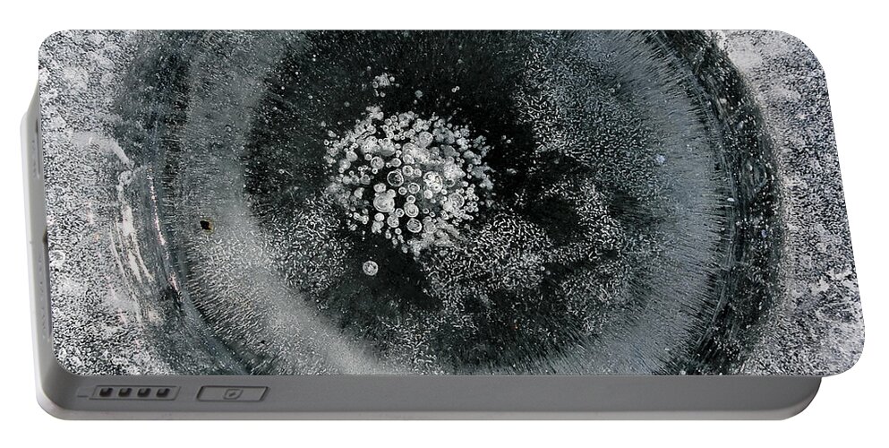 Ice Portable Battery Charger featuring the photograph Ice fishing hole 9 by Steven Ralser