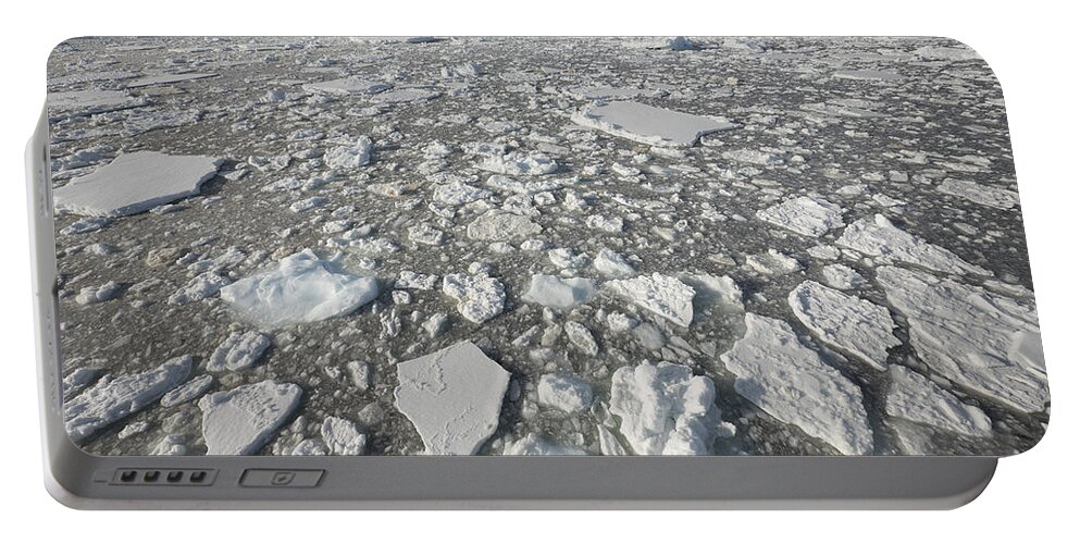 Gerry Ellis Portable Battery Charger featuring the photograph Ice Floes Antarctica by Gerry Ellis